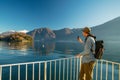 Chinese tourist makes a video of idyllic landscapes on Lake Como