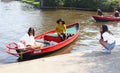 Chinese tourists electric boat canal, Giethoorn, Netherlands