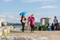 Fun and Laughter: Chinese Tourists Capture Playful Moments in Nis\' Old Medieval City-Fortress