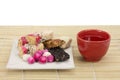 Chinese tradition candy with tea Royalty Free Stock Photo