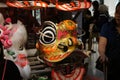 Chinese tradition lion mask or lion head displayed on the rack.