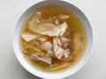 Chinese traditional american ginseng soup with chicken bones served in a bowl Royalty Free Stock Photo