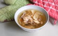 Chinese traditional american ginseng soup with chicken bones served in a bowl Royalty Free Stock Photo