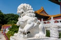 Chinese traditional culture, ancient Chinese marble stone female lion sitting lion in front of New Yuan Ming Palace in Zhuhai, Royalty Free Stock Photo