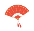 Chinese traditional folding hand fan from red silk. Open foldable handheld souvenir with oriental ornament and