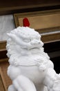 Chinese traditional house stone lion squatting in front of the gate Royalty Free Stock Photo