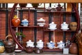 Chinese traditional tea sets, teapots and cups on mahogany shelf Royalty Free Stock Photo