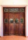 Chinese traditional wooden door closed with wood grid window of china symbol