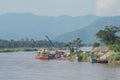 Chinese transportation park by Khong river,instaliment goods,Golden triangle,Chiang saen,Chiang rai,Thailand Royalty Free Stock Photo