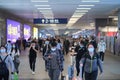 Chinese travelers in face mask walking in Hankou Railway Station in Wuhan