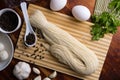 Chinese vermicelli on wooden chopping board