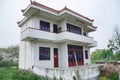 A Chinese village house and farm land Royalty Free Stock Photo
