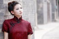 Chinese woman in the alley. Royalty Free Stock Photo