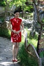 Chinese woman in cheongsam in Mudu ancient town