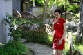 Chinese woman in cheongsam in Mudu ancient town Royalty Free Stock Photo