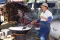 Chinese Woman Cooking Rice