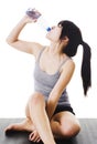 Chinese woman drinking water. Royalty Free Stock Photo