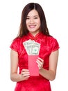 Chinese woman hold lucky money with USD Royalty Free Stock Photo