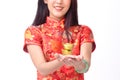 Chinese woman holding gold ingots for chinese new year Royalty Free Stock Photo