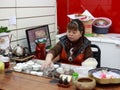 Chinese woman performing the tea ceremony