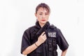 Chinese woman police officer with pistol Royalty Free Stock Photo