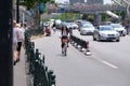 Chinese woman riding bicycle in Shanghai