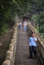 Tourists on steps on mountain trail in Huashan mountain Royalty Free Stock Photo
