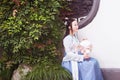 Chinese woman in traditional Hanfu dress play in a garden Royalty Free Stock Photo