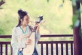 Chinese woman in traditional Hanfu dress,play traditional instrument of pipa