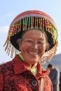 Chinese woman in traditional Miao attire during the Heqing Qifeng Pear Flower festival