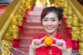 Chinese woman wearing traditional costume during Chinese New Yea