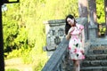 A Chinese woman wears traditional dress in the water park of Shanghai Royalty Free Stock Photo