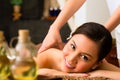 Chinese Woman at wellness massage with essential oils Royalty Free Stock Photo