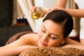 Chinese Woman at wellness massage with essential oils Royalty Free Stock Photo