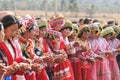 Chinese women dressed with traditional clothing dancing and singing during the Heqing Qifeng Pear Flower festival