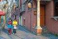 2 Chinese women walk in French Concession in Shanghai, China