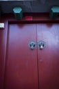 Ancient door placed on Characteristic wall Royalty Free Stock Photo