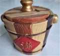 Chinese wooden rice bucket container representing abundance wealth success