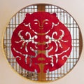 Chinese wooden window with paper-cut Royalty Free Stock Photo