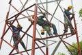 Chinese worker painting steel structure