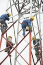 Chinese worker painting steel structure