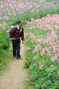 Chinese worker spraying pesticides