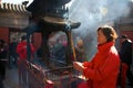 Chinese worshippers burned incense and made wishes in White Cloud Temple during Chinese New Year, Beijing, China