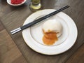 Chinese yolk custard lava steamed bun closeup. Royalty Free Stock Photo