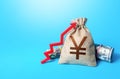 Chinese yuan or japanese yen money bag and red up arrow. Economic growth, GDP. Increase in the deposit rate. Increase income and