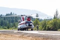 Chinook helicopter and fire crew