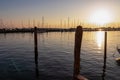 Chioggia - Beautiful sailing boats gracefully adorn the picturesque port of the charming town of Chioggia at sunrise Royalty Free Stock Photo