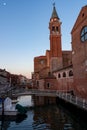 Chioggia - Church of Saint James Apostle with view of canal Vena nestled in charming town of Chioggia Royalty Free Stock Photo