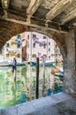 Chioggia glimpse from the arcades. Royalty Free Stock Photo