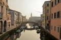 Cityscape of Chioggia historic city center. Canal Vena with boats. Royalty Free Stock Photo